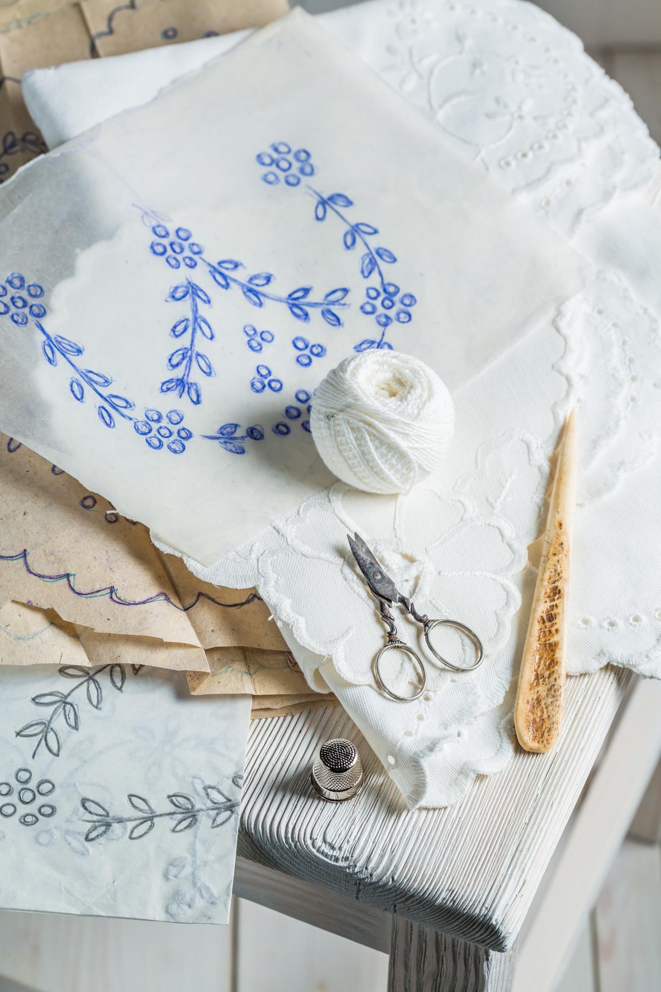 Set of embroidered linen napkins with subtle motifs